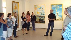 二零一一年，在德国弗莱堡“真、善、忍”画展上，安德烈给参观者讲真相