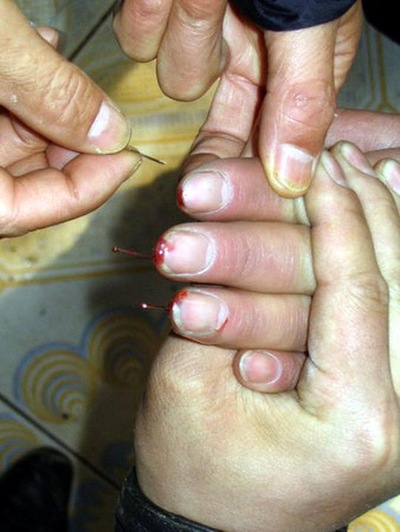 Image for article Un employé du gouvernement du Hebei brutalement torturé en prison