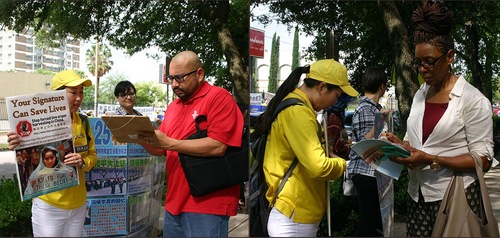 Para pejalan kaki menandatangani petisi untuk mendukung praktisi Falun Gong