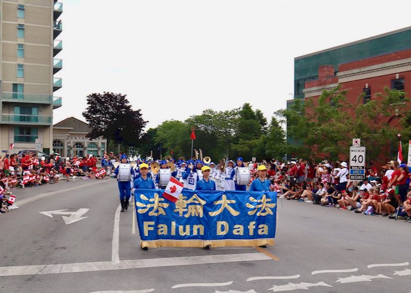 Image for article Toronto, Canada: Falun Dafa Greeted with Cheers During Canada Day Parade