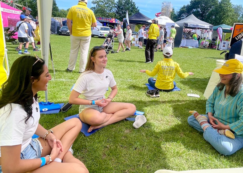 Image for article People Learn the Falun Dafa Exercises During Village Day in Surrey, UK