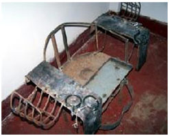 An iron chair used to torture prisoners. (Minghui.org)