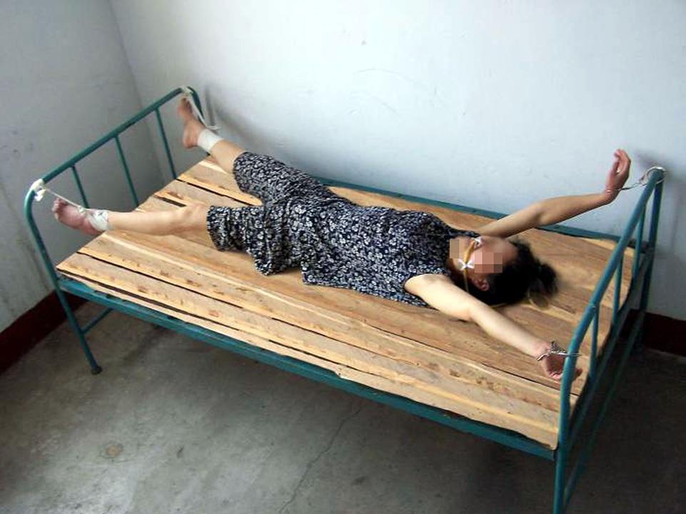 Women Chained To Bed