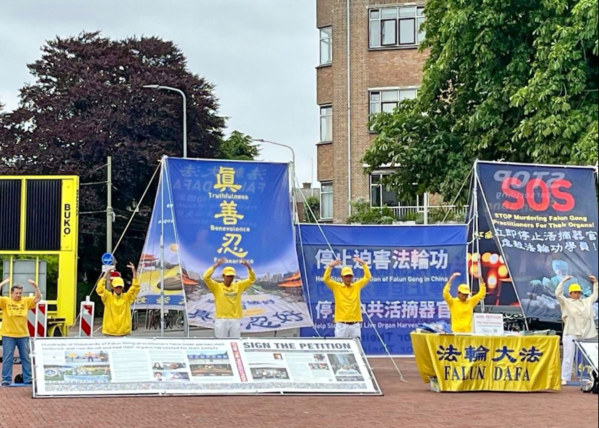 Image for article Falun Gong Practitioners Raise Awareness of Ongoing Persecution During NATO Summit in the Netherlands