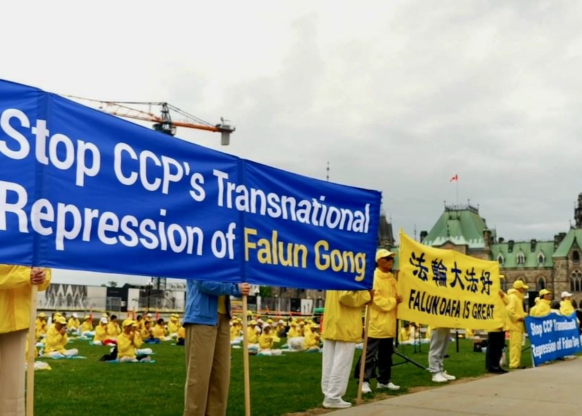 Image for article Canada: Falun Dafa Practitioners Hold Press Conference on Parliament Hill During Visit of Chinese Minister of Foreign Affairs